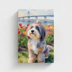 Custom pet canvas: soft watercolor-style portrait of a sheepadoodle with a pink bow in a tulip garden by a bridge, front view