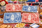 Oxford Toile Monogram Serving Trays in red and blue on a tailgate table with flowers, deviled eggs, and berries, sample AWM monogram